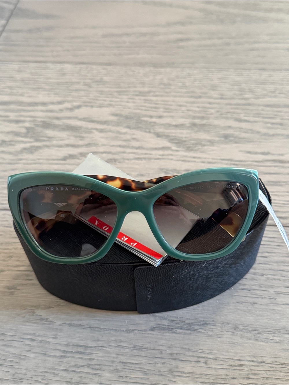Prada Green Cat-Eye Women’s Sunglasses with Brown Lenses